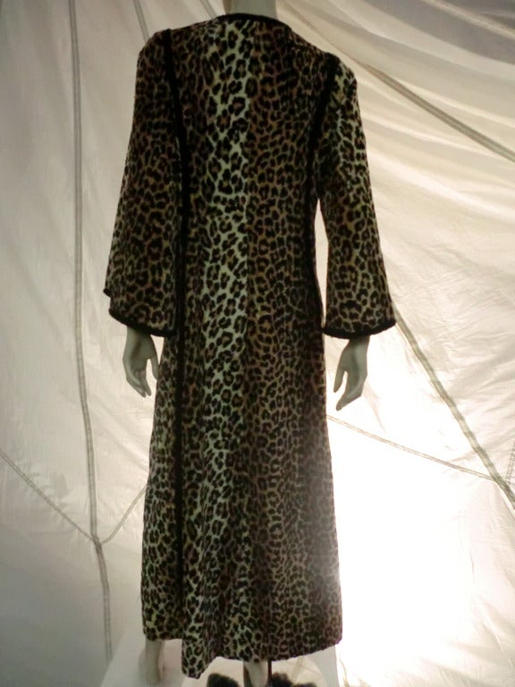 A fabulous 1960s Malcolm Starr faux leopard fur caftan with braid embellishments.