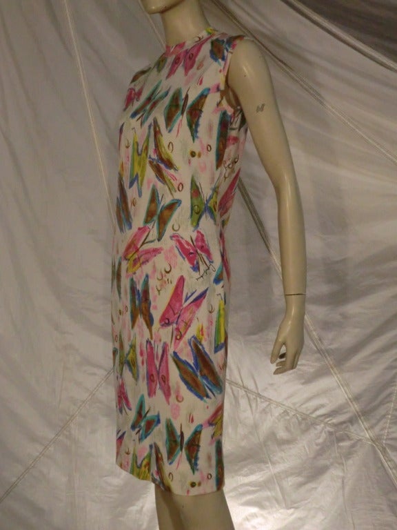 An adorable 1960s Goldworm lightweight wool jersey shift dress covered in a naive butterfly print.  Back zip.