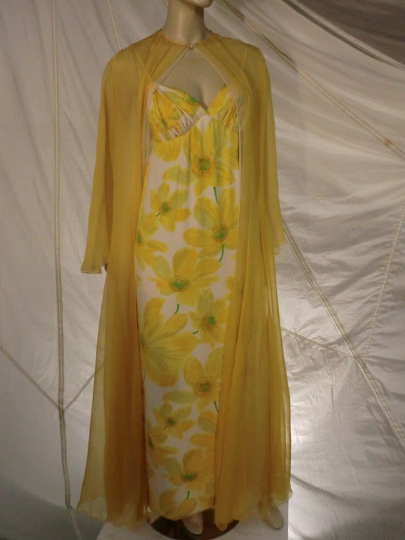 A wonderful 1960s James Galanos for Amelia Gray silk jersey column gown with plunging back.  Matching silk chiffon duster in 2-tone, 2-layer construction, full sleeves and front button closures.  Belonged to Maria Cole, jazz singer and wife of Nat