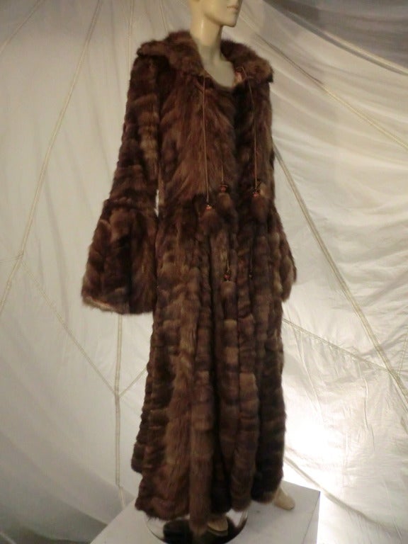 An extravagant example of Dennis Basso at his finest.  Pieced Bohemian-Chic maxi All-Sable 'Reversible' coat, unlined (pelts and stitching showing on inside), this coat feels much like a long and luxurious sweater. It has a large sable collar and