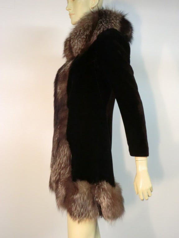 An incredible 1930s House of Worth silk velvet evening coat in a princess style (fit and flair) trimmed in luxurious fox. Labeled and in excellent condition, from the original French Haute Couture House!