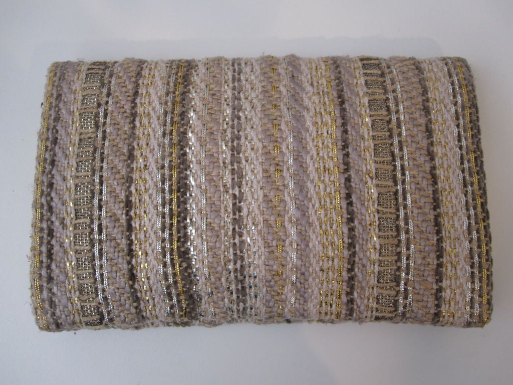 An absolutely gorgeous 1940s Harry Rosenfeld Original clutch handbag: Envelope style with button-lock closure in gorgeous gold flecked tweed and lined in glamorous gold metallic leather and silk satin. So chic.