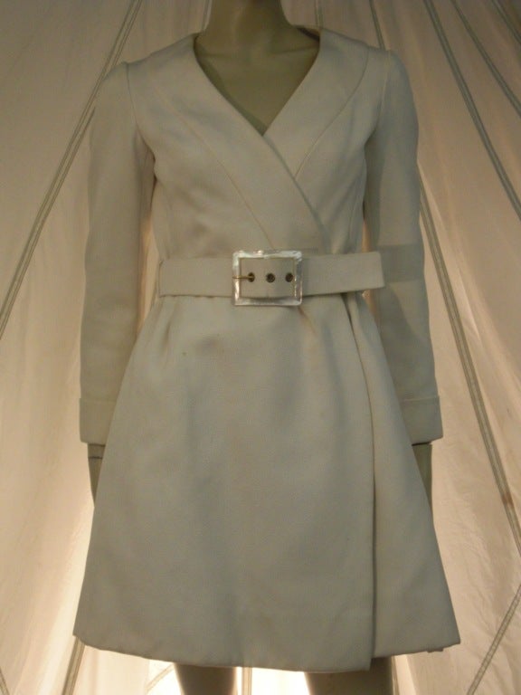 A gorgeous, kimono inspired wrap coat dress or jacket in ivory silk faille:  Concealed buttons and hook, collarless construction with very fitted shoulders, arms and bodice.  Original belt.  Sold at Bonwit Teller.