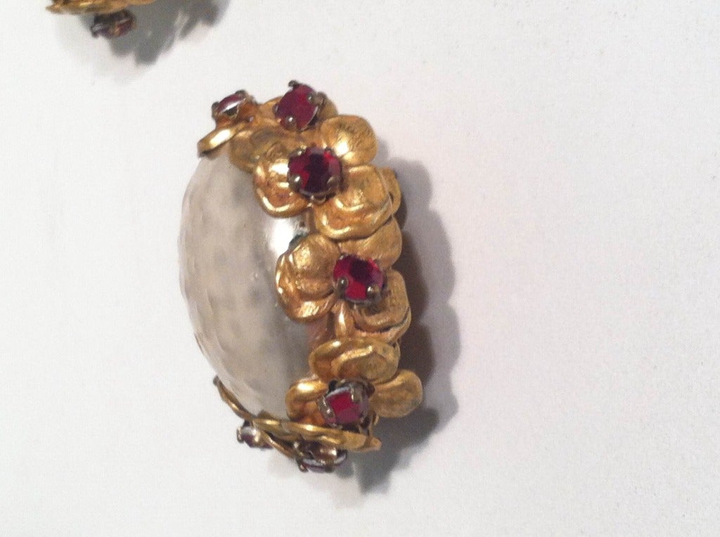 Gorgeous 1940s Miriam Haskell large button earrings in faux baroque-style pearl and floral metal edging studded with ruby red rhinestones. Marked 