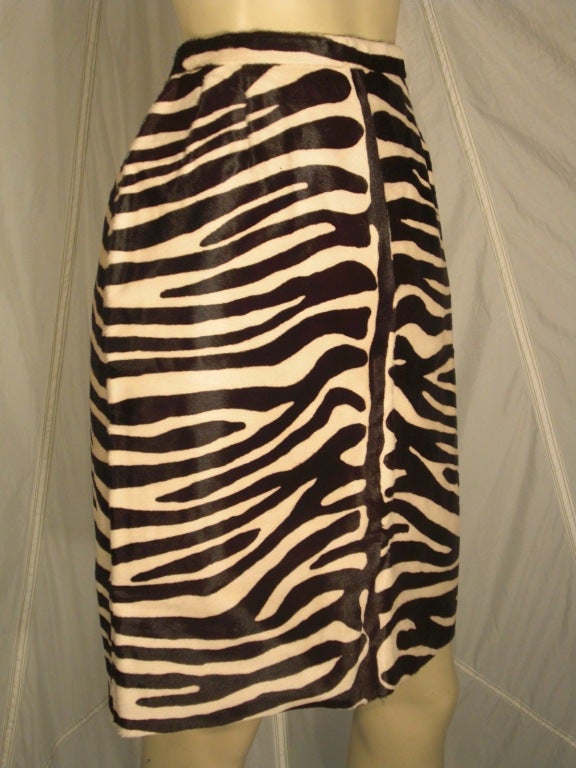 A fabulous 1980s Bill Blass pencil skirt:  Fully lined, zebra stenciled genuine calf hide skirt with waistband and zip.