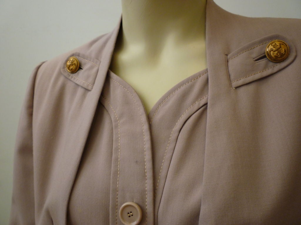 This is a wonderful Pierre Balmain summer weight skirt suit in a great almond color neutral tone!  It is from the late 40s and has very similar design elements in the jacket as Dior's 