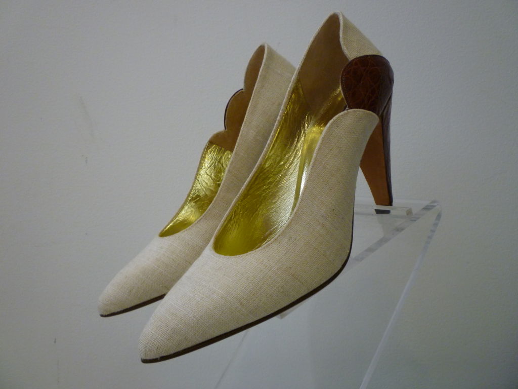 Not only are these Walter Steiger 1980s alligator and linen pumps gorgeous and classic, but they have never been worn!  Great scalloped detail at back of shoe!  Marked a 7 1/2 B.