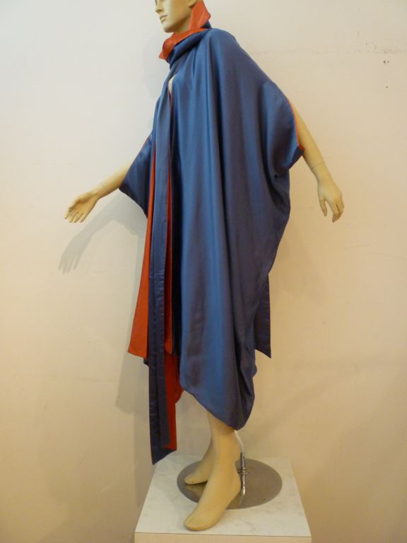 Unbelievably chic Erté (Attributed by seller) 1920s Art Deco reversible silk cocoon coat w/ foulard in a stunning cardinal red/royal blue combination!  Stunning!  In as is condition with some water marking on the foulard.