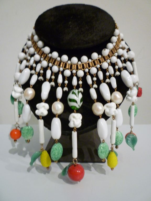 A fantastic 1950s Miriam Haskell style bib necklace (unmarked) in milkglass beads and glass fruit!  A wonderful piece for dinner in the tropics!  <br />
<br />
Dimensions: <br />
<br />
15