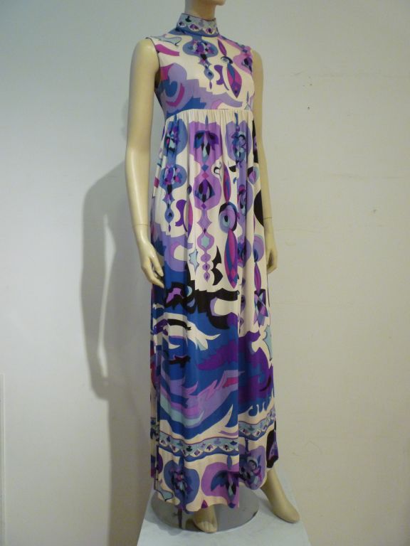Wonderful full length empire style Emilio Pucci 60s silk jersey gown in a gorgeous print!  Sleeveless baby doll style bodice with band neck and a gathered flowing jersey skirt.  Original silk jersey cord belt with bead tassels included.  Originally
