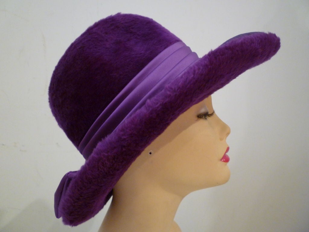 A smart vibrant purple mohair felt 60s fedora with silk satin bow band from Mr. Charles!  Inner band measures 21.5