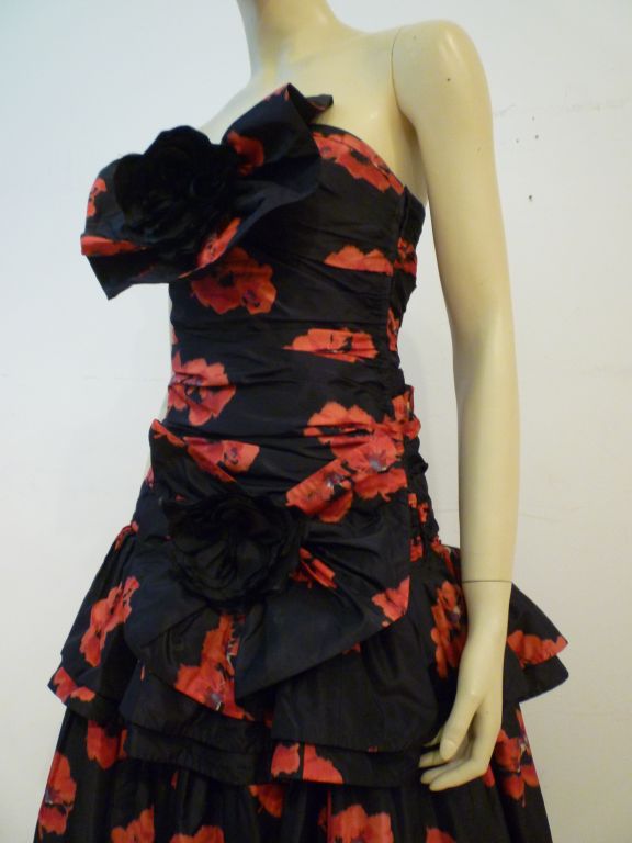 An absolutely stunning and charming 70s Nina Ricci strapless gown in a lightweight silk taffeta with a 