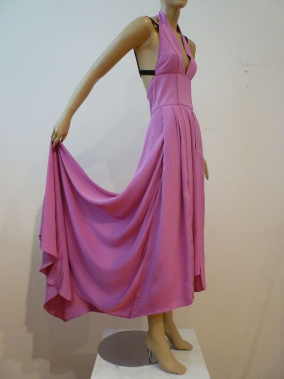 A vibrant modern Narcisco Rodriguez silk crepe halter gown in vivid pink with black velvet lingerie strap detail, and a raked hem--shorter in front with a train in back!  Marked an Italian 42, US 6.