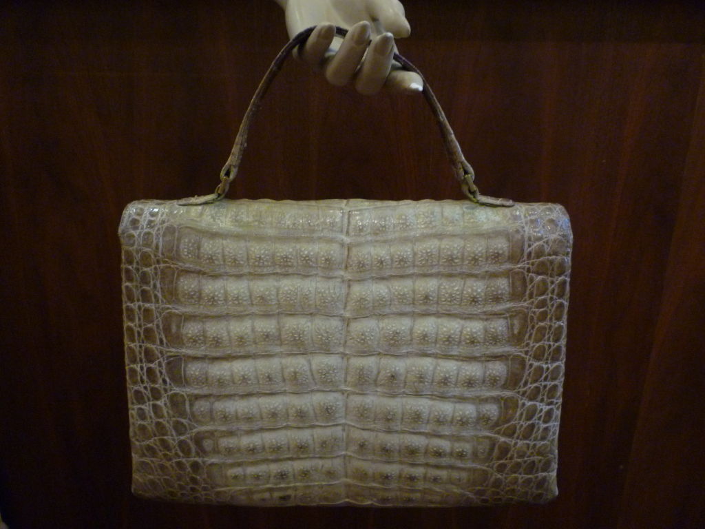 Comtesse brand hombré natural crocodile skin 1950s bag with gorgeous tan and beige tones.  Triple compartment interior, one of which has a zippered pocket and pen sheath.  push button gold tone closure.<br />
<br />
9