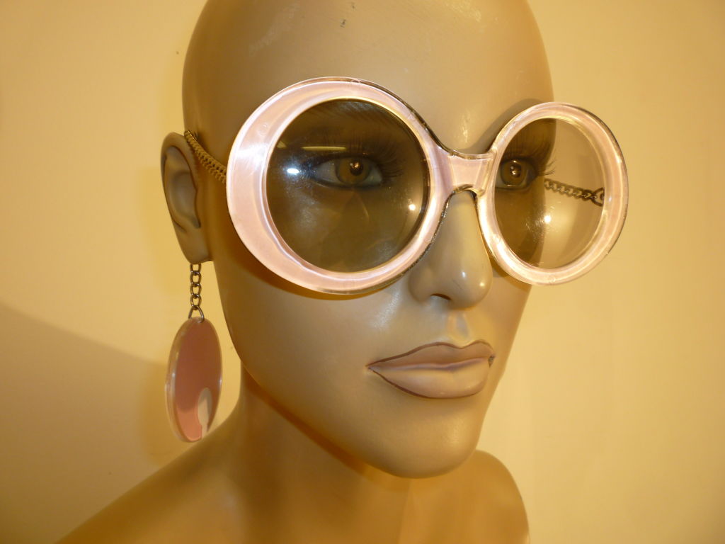 Wonderful, mod 60s round sunglasses with chain earpieces and attached medallion 