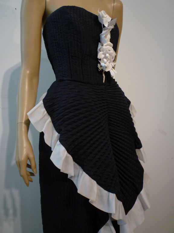1980s André Laug Couture quilted silk gown with white organza trim and handmade parchment flowers.