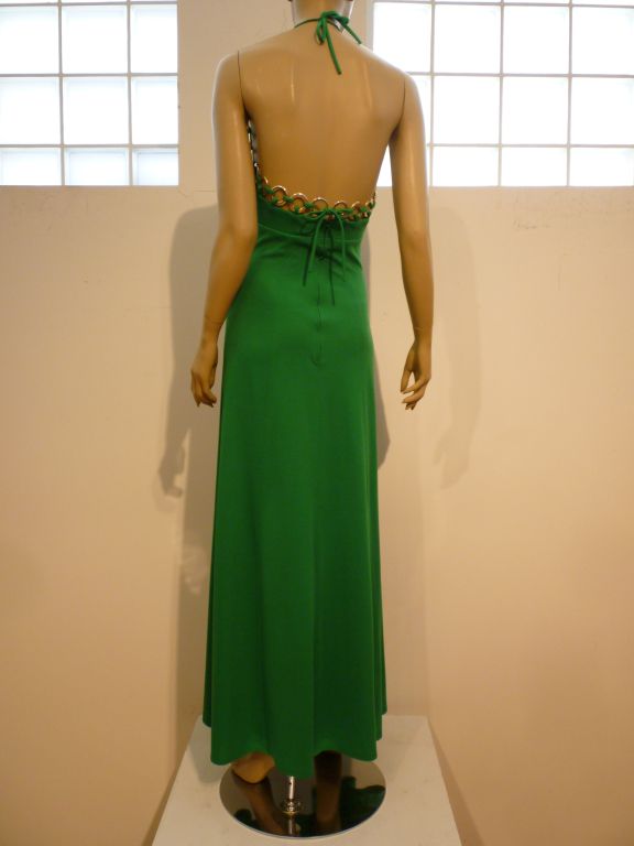 A fun, swinging Jack Hartley Inc. kelly green 60s jersey halter maxi-dress with mod ring detail around the neckline and back.  Size 5/6. In great condition, with some rings changing color.