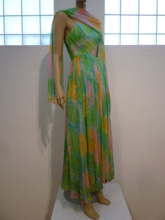 Nat Kaplan 60s double layered, hand-painted silk chiffon and painted silk satin lined dress w/ fitted bodice, spaghetti straps, and full flowing skirt.  Includes original matching silk chiffon foulard.