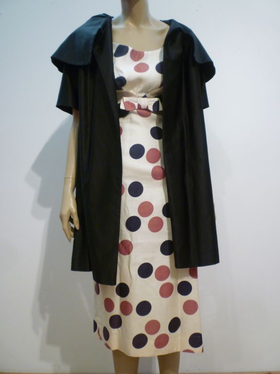 An adorable, whimsical set in light summer cotton featuring a fantastic brown and black polkadot print dress and a black polished cotton 3/4 length sleeve coat with a coordinating print lining from Molly Modes!  Size 8.