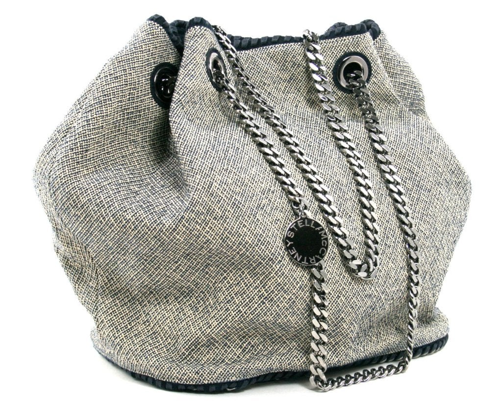 This authentic Stella McCartney Tweed Falabella Tote is in mint condition, carried two or three times at most.  An animal advocate, Ms. McCartney’s bags use only the finest materials available to create fashionable pieces that are earth friendly and