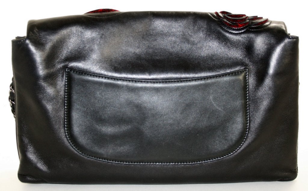 Chanel Black Lambskin Camellia Runway Flap Bag In Excellent Condition In New York City & Hamptons, NY