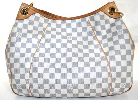 This authentic Louis Vuitton Damier Azur Galliera PM is a highly coveted retired style.  The perfect lightweight shoulder bag for every day, the MM is amply sized and always chic.  This Galliera is in very good condition with the majority of wear on
