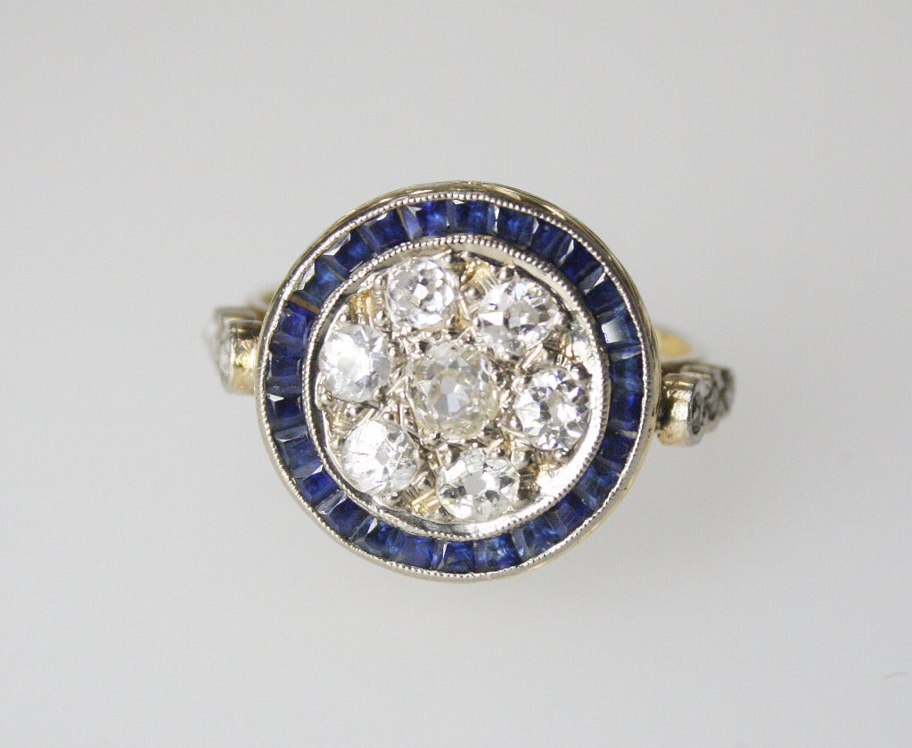 Diamond and sapphire ring set with 6 diamonds weighing approximately 1.05 carats, and 26 sapphires weighing approximately 0.65 carats.

Size 7 1/2  Can be sized. No charge.