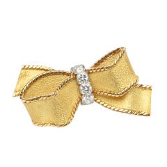 1960s Cartier Gold Diamond bow pin