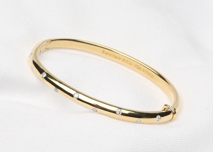 Easy to wear.  Classic Tiffany bangle bracelet sprinkled with diamonds!!