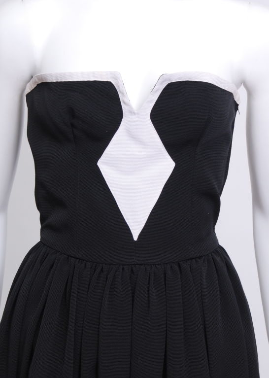 Black cotton rayon mix grosgrain strapless dress with white diamond detail and border. Fully lined with partial boning at bust.