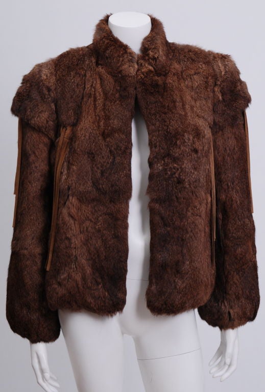 Brown rabbit fur jacket with suede tassel detail. Fully lined in silk. Looks fabulous paired with jeans or leggings.
