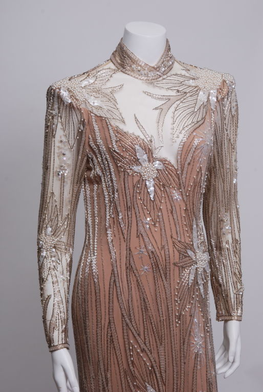Sexy long, sculpted, full sleeve, pearl and glass encrusted blush/nude colored silk and sheer net. This dress looks as if it is painted on. <br />
<br />
 Robert Gordon Mackie was born on March 24, 1940 in California. He is best known for his
