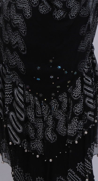 Zandra Rhodes 70's screen-printed silk chiffon dress, adorned with faux pearls and iridescent star sequins. Silk jersey slip included.