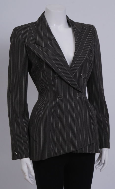 Thierry Mugler textured, double breasted pinstripe blazer, woven of taupe, black and ivory cotton and silk. Acetate lining.<br />
<br />
Thierry Mugler's early training was as a ballet dancer, but he also studied design and created garments for