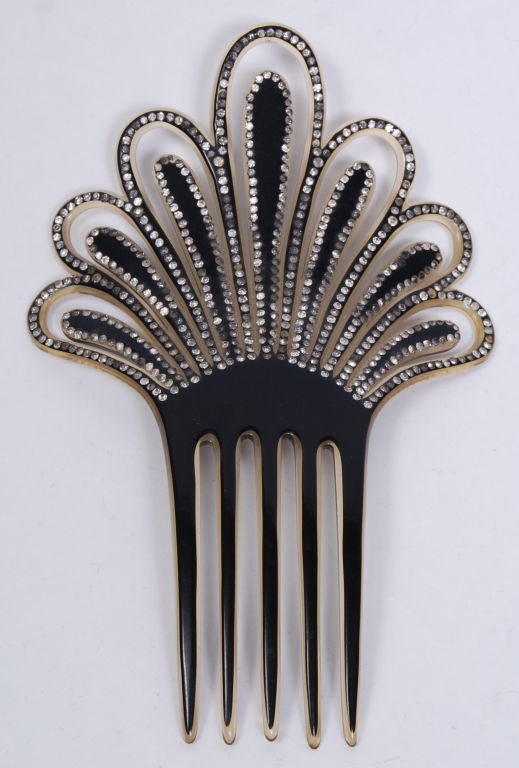 1920's rhinestone encrusted resin hair comb. A stunning accessory to any up-do.