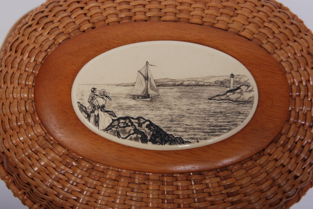 Nantucket basket bag with intricate scrimshaw scenic coastal design carved into bone. Fully lined, kept in pristine condition.