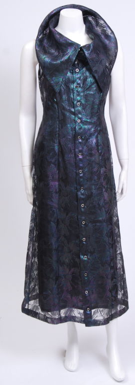 Blue iridescent floral print organza dress with shawl collar and shell buttons. Separate slip included. Organza matching hat sold separately.<br />
<br />
Debbie Harry began her musical career in the late 1960s with folk rock group The Wind in the