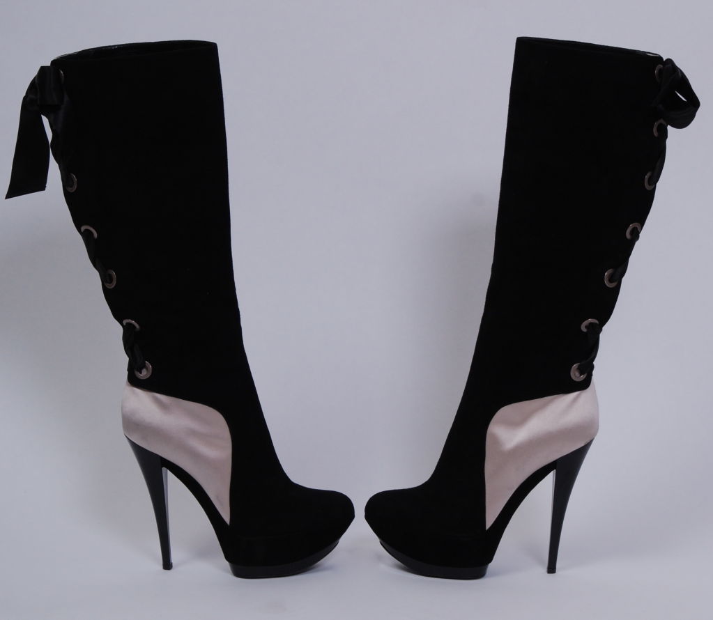 Ultra sexy silk satin and luxurious suede lace up platform boots from Italian shoe designer, Casaedi. <br />
<br />
Debbie Harry began her musical career in the late 1960s with folk rock group The Wind in the Willows and later joined The Stilettos