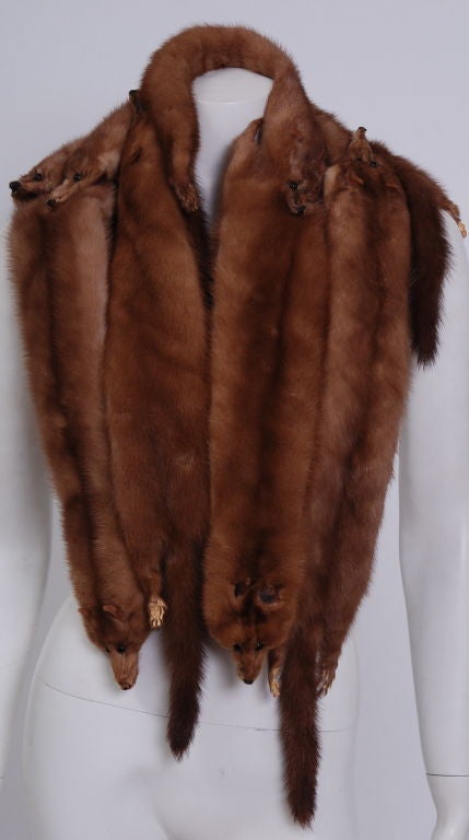 Eccentric, extravagant mink pelt collar. Can be worn in a variety of ways. Two separate scarves worn as a full bib or separately. Beautiful atop of a coat, blazer or sweater.