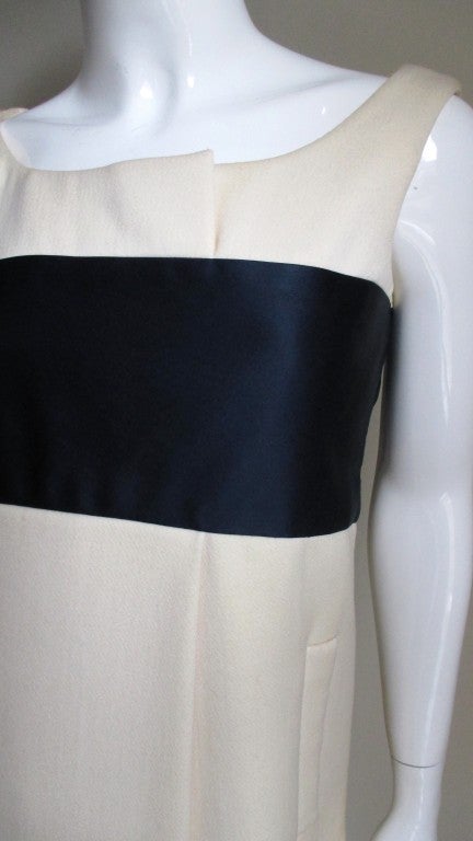 A graphic color block sleeveless wool dress from Geoffrey Beene.  Off white substantial weight wool dress with a navy wool/silk 5