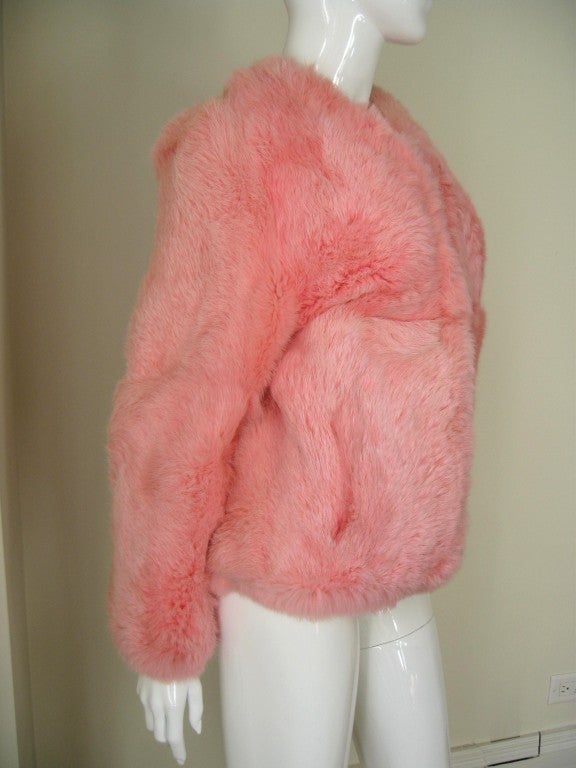 Soft fur jacket with colorful pucci-esque lining.  Fur has a slight wave pattern, front slash pockets and closes with 3 hooks.  Color is closest to images 4 and 5.
Sizes 4-8

Excellent condition.

Bust  38