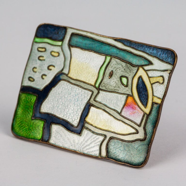 Mid Century Modern David Andersen Norway four seasons enamel pin in the winter color version. Gold vermeil over sterling, applied enamel held within the surface pattern. Intricate guilloche patterning shows through the rich enamel colors. Designed