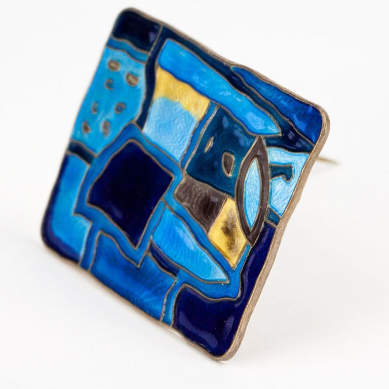 Mid Century Modern David Andersen Norway four seasons enamel pin in the spring color version of sky blue, deep turquoise, yellow, and brown. Gold vermeil over sterling, applied enamel held within the surface pattern. Intricate guilloche patterning