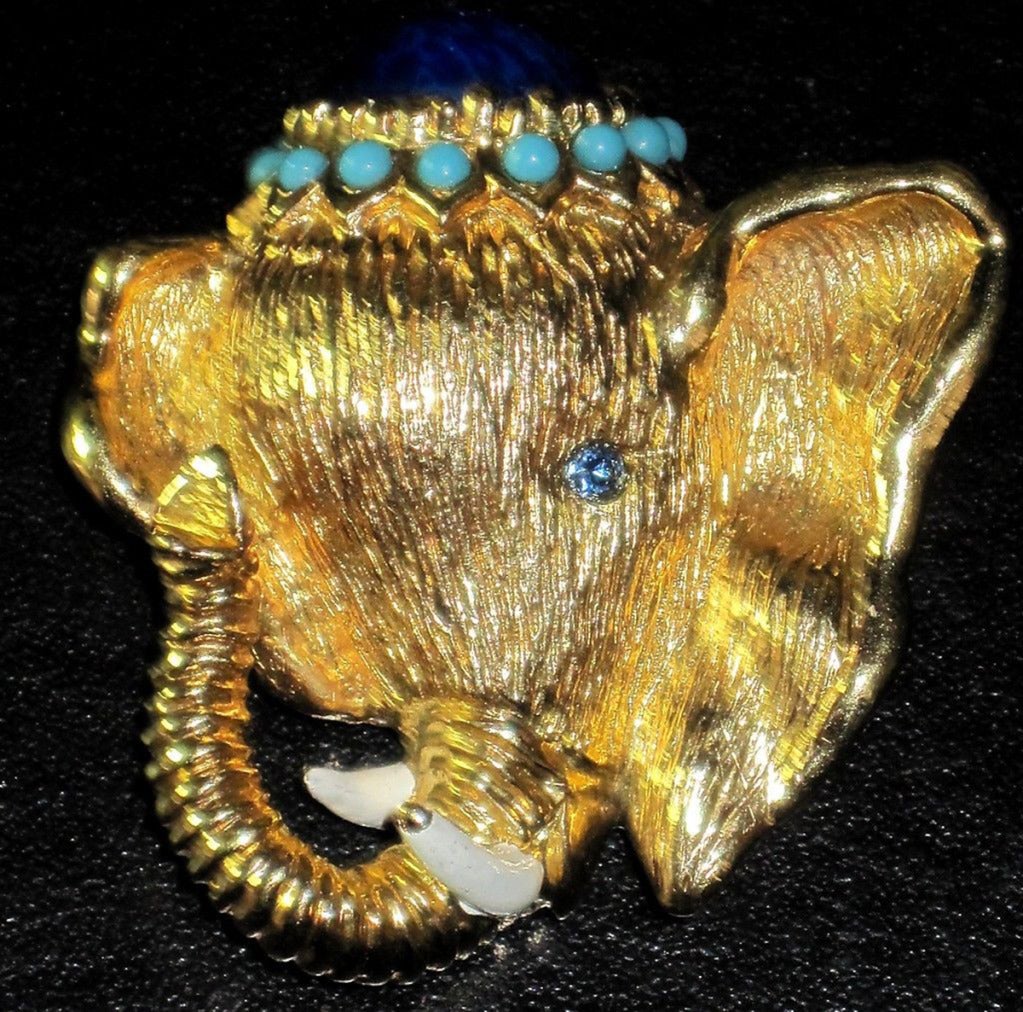 Wonderful signed Panetta Golden Elephant head with a Lapis blue crown and turquoise blue glass beads. Unique and Fabulous as you are!