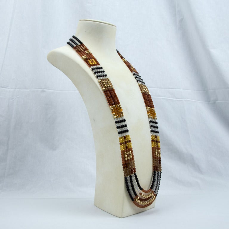 An Impressive, yet understated, long five strand Patchwork Necklace comprising multicolored glass and gold-filled beads in rich Autumn tones. Unique and Fabulous as You are!