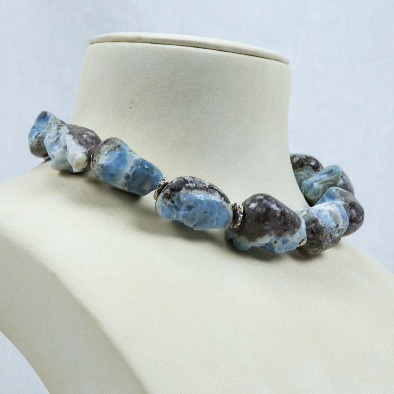 Sensational Natural Boulder Nugget Opal Beads Statement Necklace inter-spaced with sterling silver. A show stopper that’s clearly perfect for dressing up your outfit!