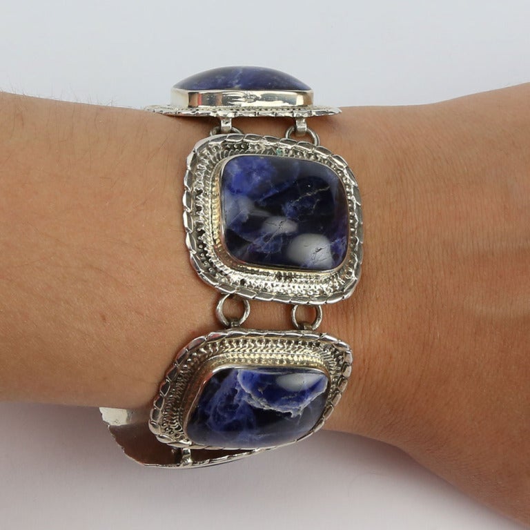 Dynamic Sterling Silver Toggle Bracelet; signed ATI; each large beautifully  worked rectangular surround  is set with a Lapis Lazuli; Marked: MEXICO 925 ATI; approx length of bracelet: 7.5”