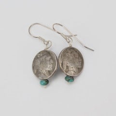 Modernist Turquoise and Silver American Indian Heads Bracelet and Drop Earrings For Sale