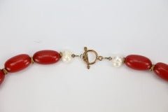Art Deco Red Amber and Baroque Pearl Necklace suspending Bronze Visvavajra Pendant