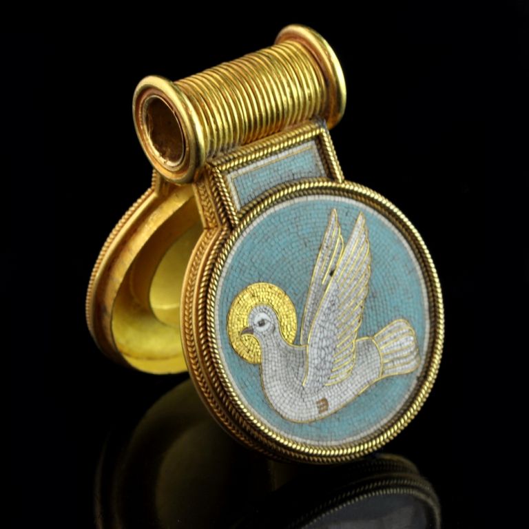 Exsquisite hinged 'Bulla' pendant in the archaeological revival style applied with rope work decoration and centering on a micro-mosaic image of a Dove representing the Holy Spirit, the reverse inscribed 'VIVAS IN DEO' within a wreath Castellani,